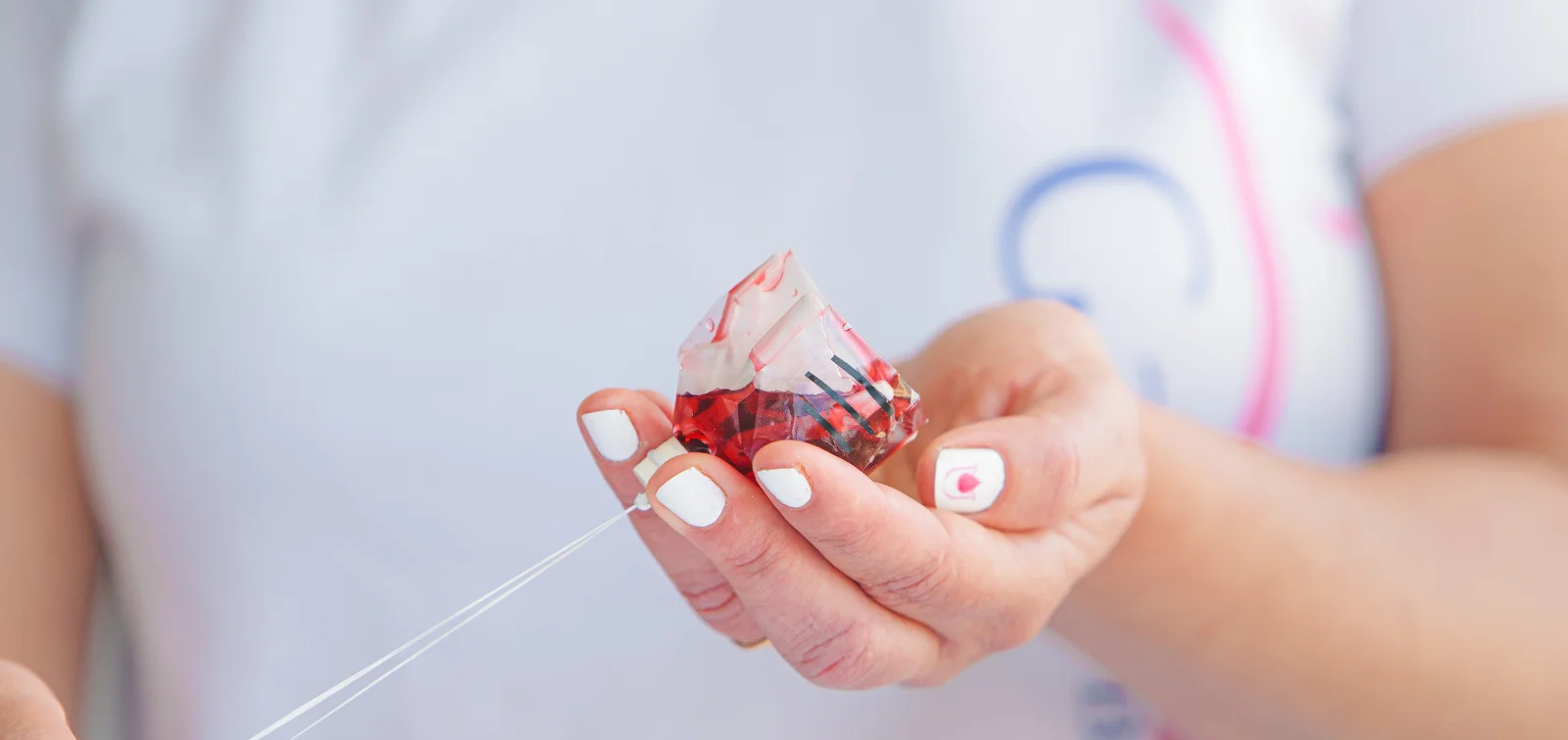 Tulipon menstrual cup shown in a hand
